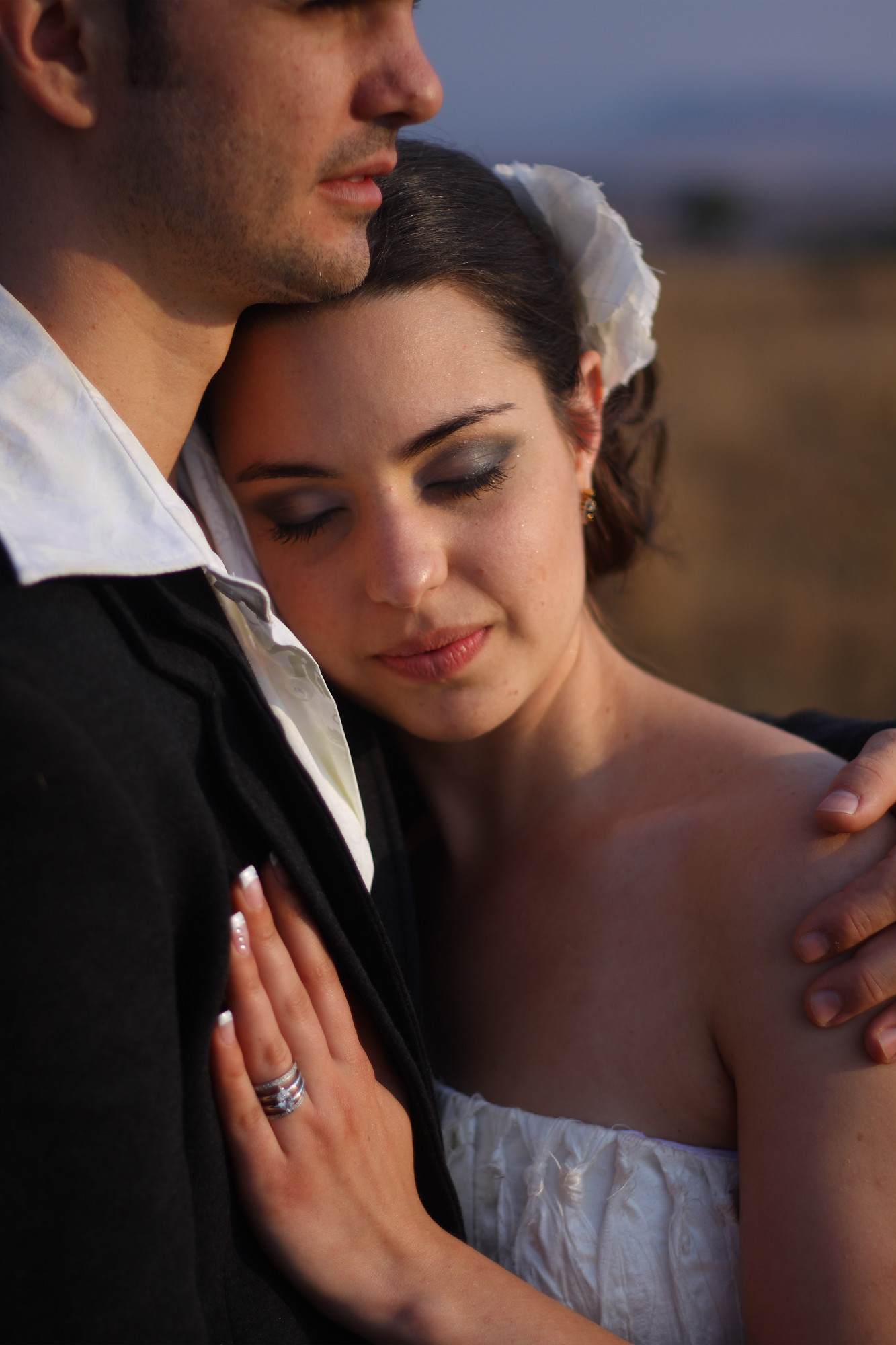A calm, intimate moment between a couple during a wedding